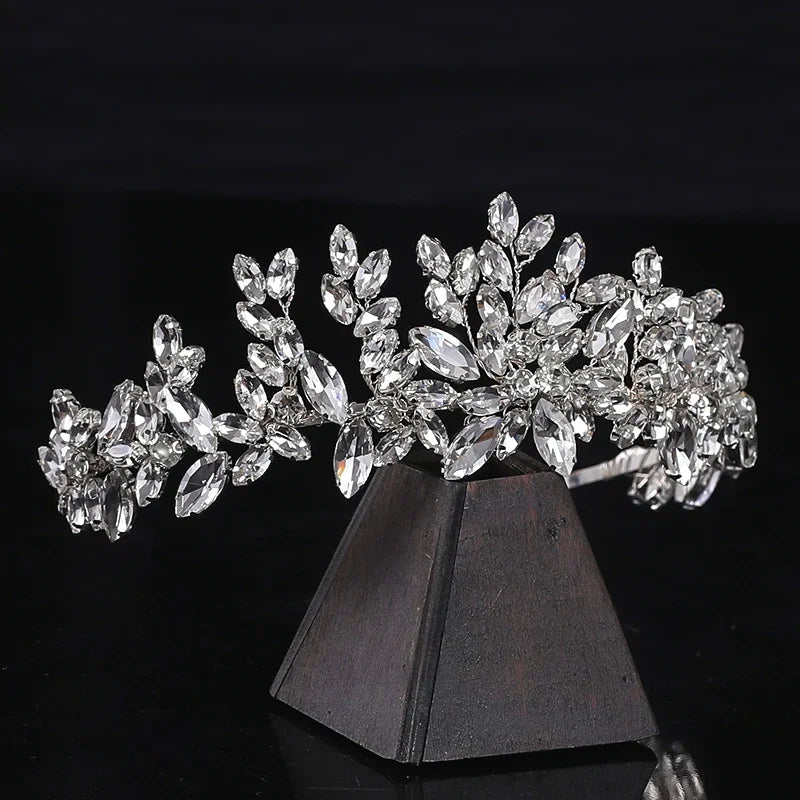 Handcrafted alloy tiara with clear crystals and rhinestones for weddings and proms.