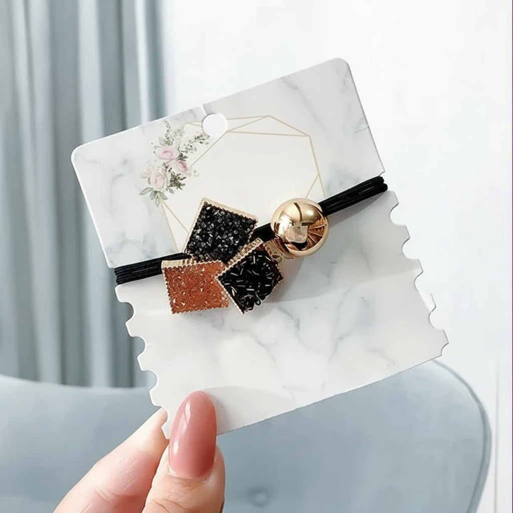 Decorative elastic hair bands for women featuring rhinestones, bows, pearls and alloy charms, styled for ponytails and daily fashion use. 