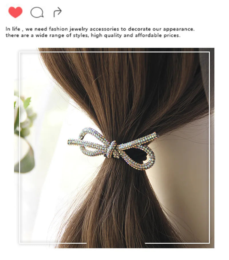Decorative elastic hair bands for women featuring rhinestones, bows, pearls and alloy charms, styled for ponytails and daily fashion use. 