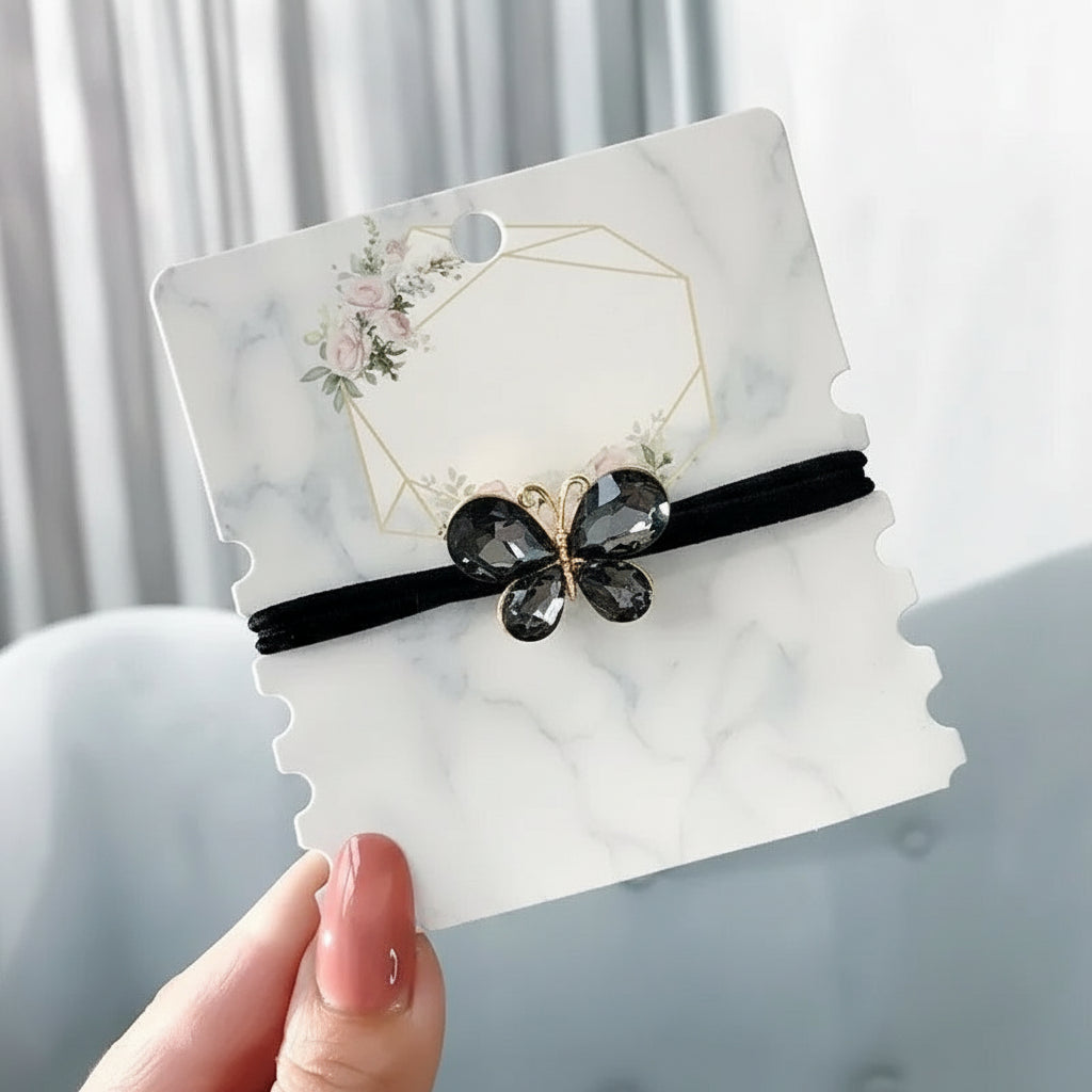 Decorative elastic hair bands for women featuring rhinestones, bows, pearls and alloy charms, styled for ponytails and daily fashion use. 