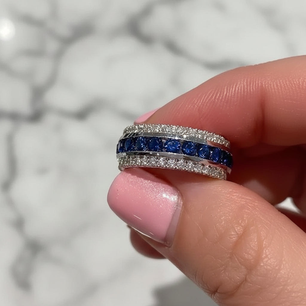 Women’s brass ring with channel-set cubic zirconia, geometric wedding band design.