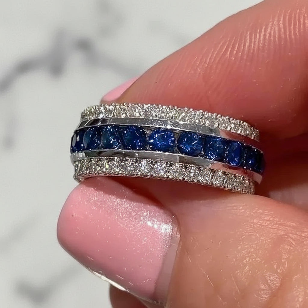 Women’s brass ring with channel-set cubic zirconia, geometric wedding band design.