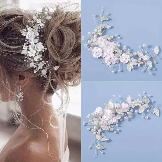 Bride wearing silver crystal floral hair vine in updo