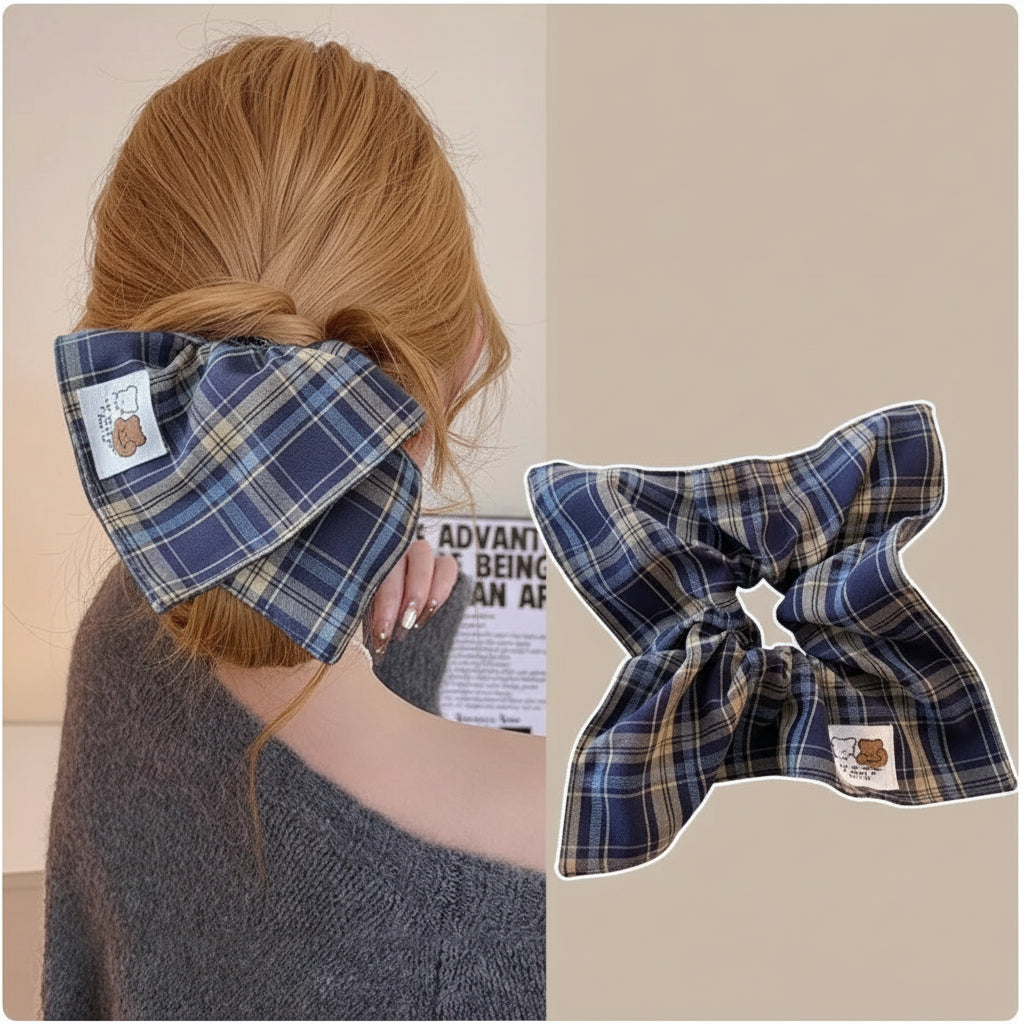 Woman wearing square plaid scrunchie tied in hair, vintage check pattern.