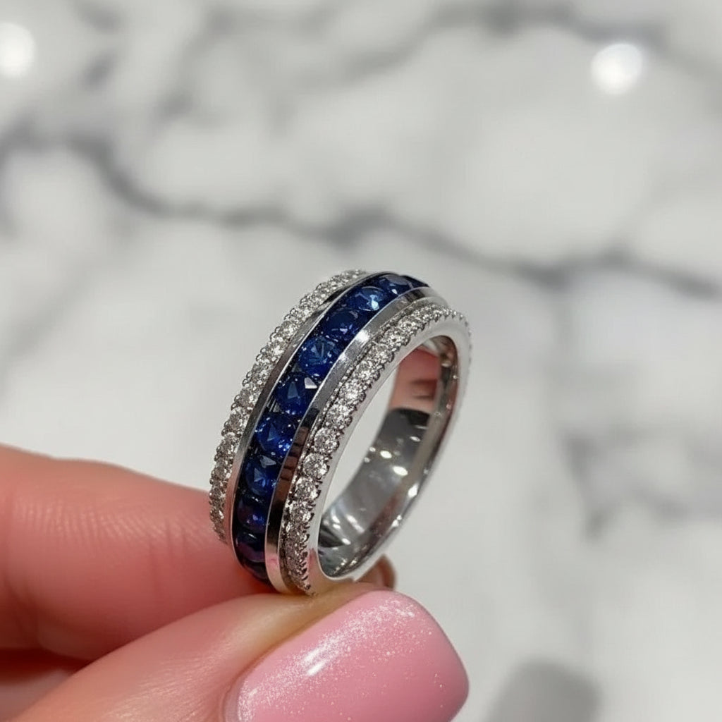 Women’s brass ring with channel-set cubic zirconia, geometric wedding band design.